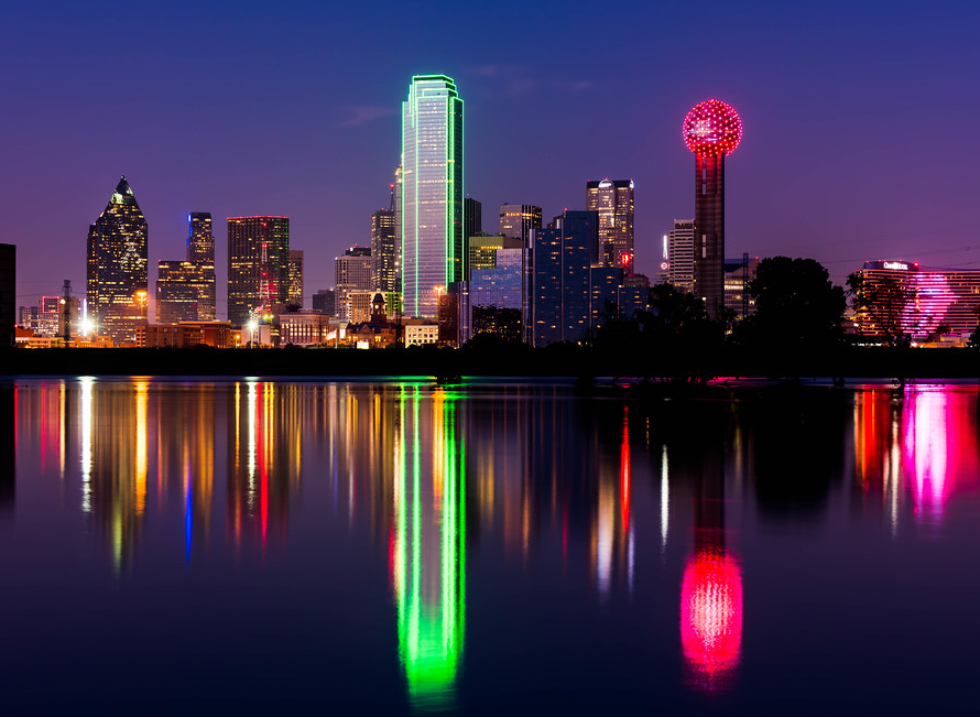 Dallas skyline at night with casino chips